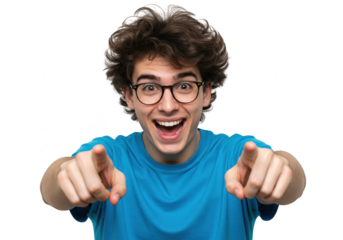 An excited young man with curly hair and glasses points forward with both index fingers, isolated on a transparent background