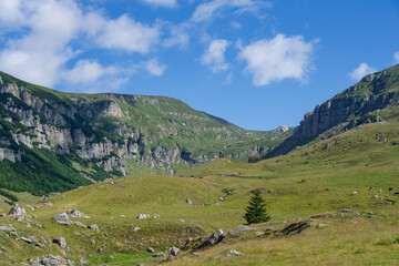 Naklejka premium mountain landscape with blue sky, Ialomita Valley, Bucegi Mountains, Romania 