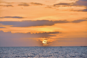 	
Sunset sky clouds in the Evening with Golden orange sunlight in golden hour, Dusk sky background	
