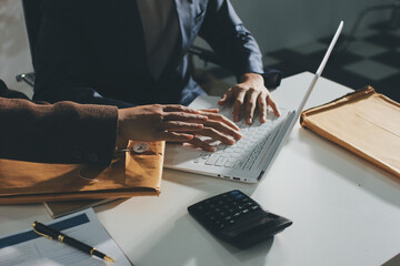 Lawyer explained to the client about the law that must be brought against the court case.