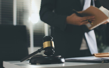 Lawyer explained to the client about the law that must be brought against the court case.