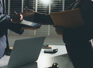 Lawyer explained to the client about the law that must be brought against the court case.