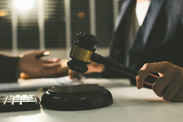 Lawyer explained to the client about the law that must be brought against the court case.
