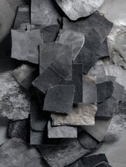Dark grey slate stone texture. Abstract background for design. Ideal for architecture, construction, and interior projects.
