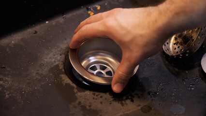 Plumber repair mounting new kitchen sink pipes