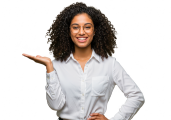 A smiling businesswoman with curly hair and glasses presents with an open hand, isolated on transparent background