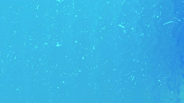Fondo azul con part&iacute;culas en suspensi&oacute;n