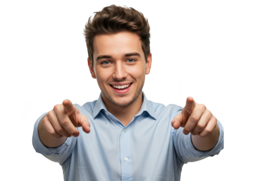 A young man in a blue shirt smiles and points directly at the camera, isolated on a transparent background