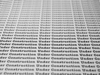 Words Under Construction Seamless print on paper for business background.