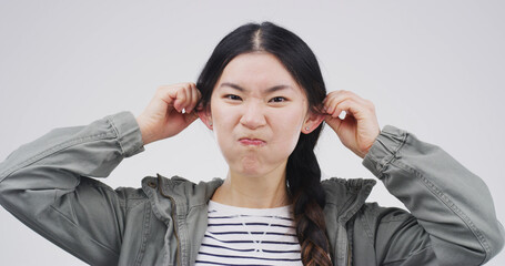 Studio, portrait and woman with funny face, silly or facial expression for humor, gesture or comic....