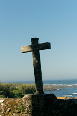 stone cross on the coast of Galicia, way to santiago along the seaside