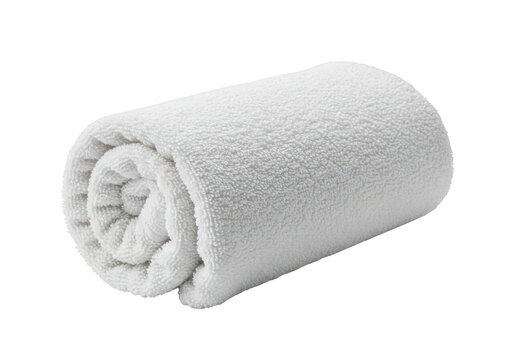 A soft, fluffy white towel rolled up neatly, isolated on a transparent background