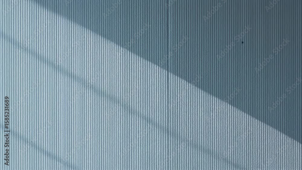 Poster abstract depiction of light and shadows creating streaks on a blue background with vertical lines