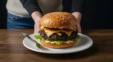 Freshly Assembled Cheeseburger with Lettuce and Tomato Served on a White Plate with Hands