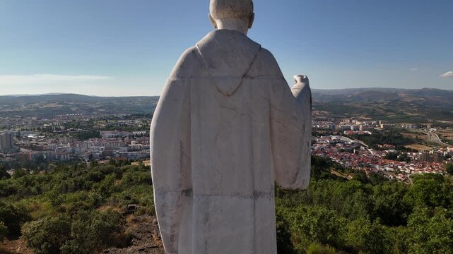 Aerial view of Saint Bartolomeu statue overlooking Braganca, Portugal