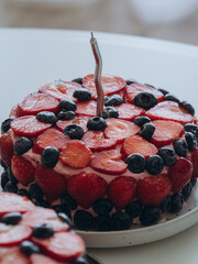 Homemade birthday cakes with berry decor