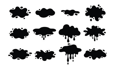 Various black ink blotches and splatters arranged on a white surface for graphic design elements