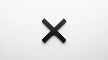 Obraz premium A simple black cross shape isolated on a clean white background. Minimalist design with a modern aesthetic. Perfect for various design projects.