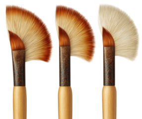 Three fan-shaped paintbrushes, varying in color