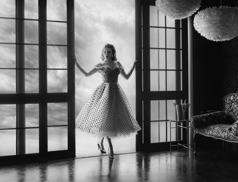 Dark silhouette retro lady beauty woman opens doors and enters room from balcony walking in classic luxury room. Vintage dress. Sexy Girl fashion model 30s pin-up old style black and white art photo