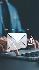 A focused individual sits at a wooden desk, typing on a sleek laptop, with a digital email envelope icon visible on the screen, symbolizing communication.