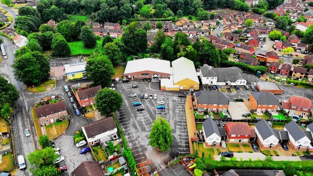 Aerial view of the Masonic Centre surrounded by houses, trees and streets in Maidstone, Kent, UK