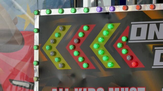 Blinking arrow lights on carnival ride