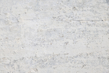 Weathered peeled paint whitewash wall texture outdoors in daylight