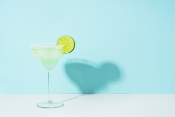 Margarita cocktail. Summer alcohol drink with silver tequila, liqueur, lime juice, sugar syrup,...