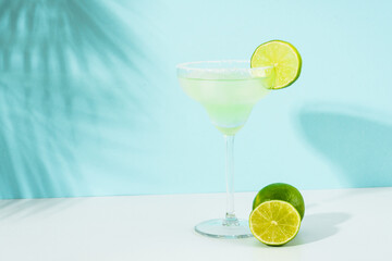 Margarita cocktail. Summer alcohol drink with silver tequila, liqueur, lime juice, sugar syrup,...