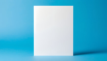 Blank White Paper Sheet Mockup on Blue Background