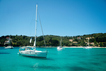 Sailboats Anchored in Turquoise Bay