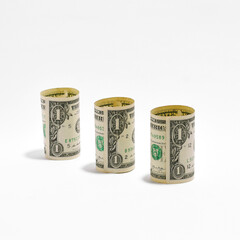Three Rolled US Dollar Bills on White Background - Financial Savings & Investment