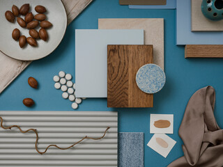 Elegant  flat lay composition in blue, brown and beige color palette with textile and paint...