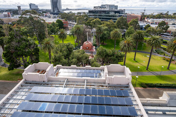 Modern solar panels installed on the rooftop of the Geelong Gallery, with views overlooking a green...