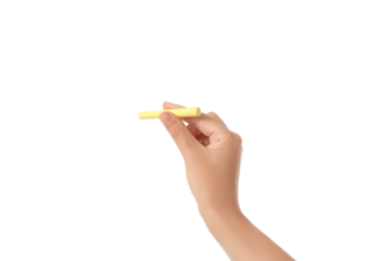 Hand grips yellow chalk for writing or drawing, isolated on white, PNG