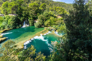 Obraz premium Scenic Waterfalls and lakes in a Lush Green Forest, National Park Krka, Skradin waterfalls , Croatia