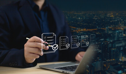 Business performance checklist concept, Take an assessment business man, Businessman using laptop...