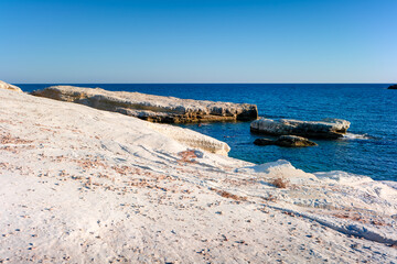 Blue water color off the coast of Cyprus, Olive Tree beach, Peyia, Cyprus.