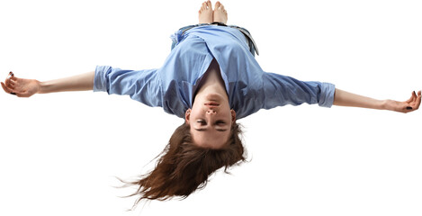 Woman upside down with open arms and closed eyes in levitation, on transparent background. Concept...