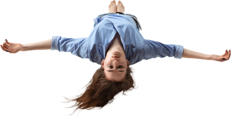 Woman upside down with open arms and closed eyes in levitation, on transparent background. Concept of surrender, balance, dreamlike state, femininity, surreal body, and visual expression.