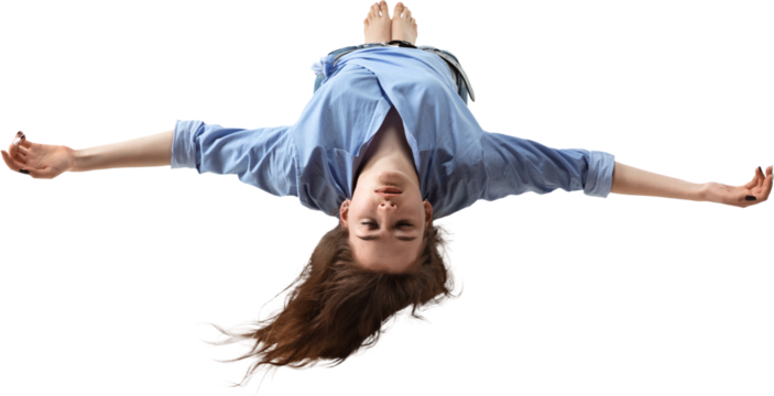 Woman upside down with open arms and closed eyes in levitation, on transparent background. Concept of surrender, balance, dreamlike state, femininity, surreal body, and visual expression.
