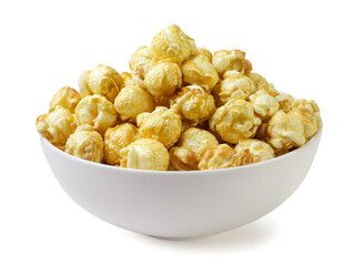 Caramel popcorn in a plate close-up on a white. Isolated