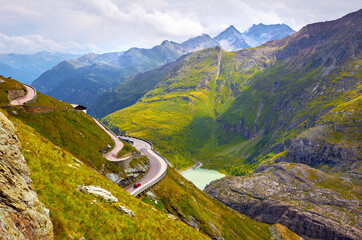 Panoramic view at Grossglockner panoramic road among austrian Alps. Mountains summits summer scenic view.