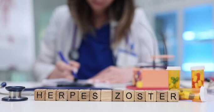 Scrabble cubes spell Herpes Zoster words aligned in front of medication bottles. Pill jars and background note connect to viral skin condition