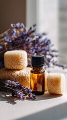 A serene still life depicts an amber glass bottle alongside natural sponges and lavender sprigs, evoking a sense of calm and wellness through organic textures and soft light.