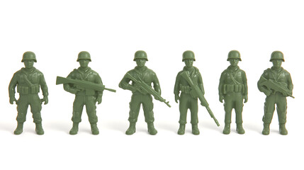 Naklejka premium Toy Soldiers: A line of green plastic figures stand ready for action, evoking nostalgia and imagination. Miniature warriors lined up against a white background.