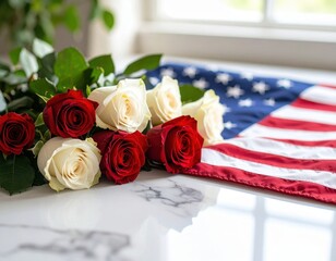 Soft morning light over a marble surface with American flag and gently placed red and white roses—a peaceful tribute for Patriot Day remembrance and honor.