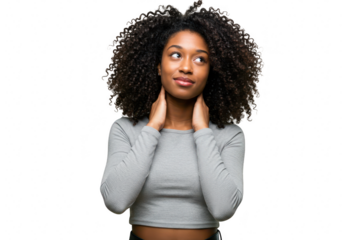 Young woman with curly hair touching her neck, looking up thoughtfully, isolated on transparent background