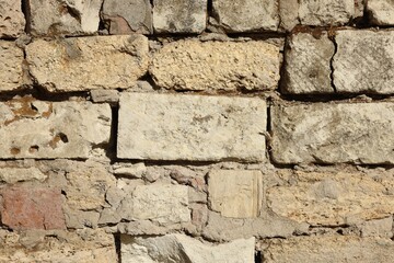 Texture of old brick wall as background, closeup